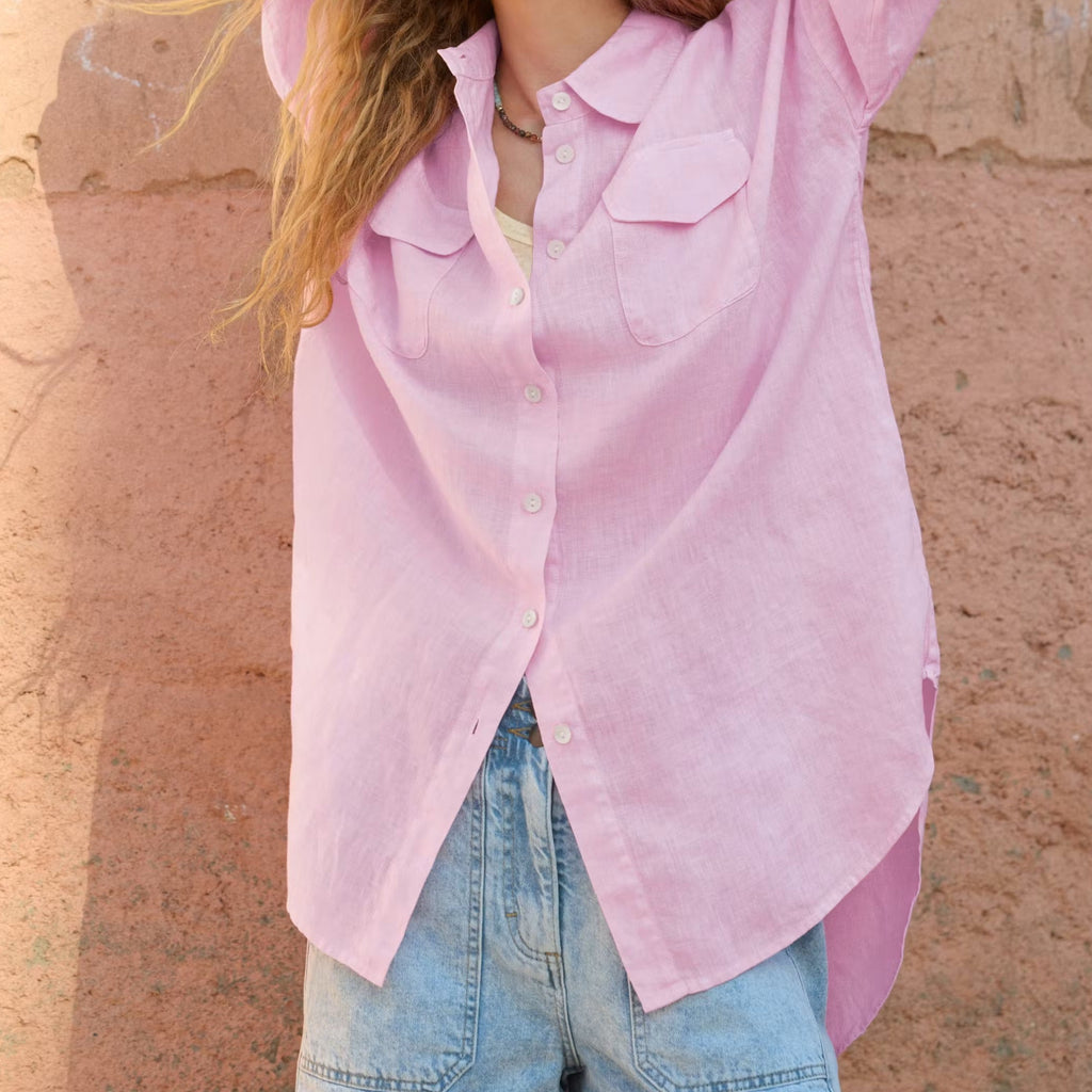 Pale pink loose fit long sleeve shirt with a collar